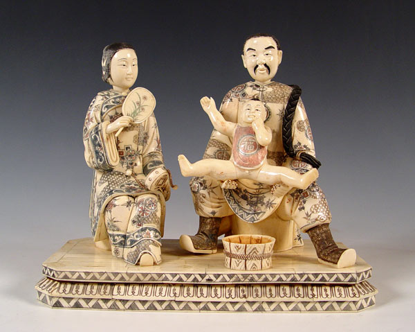 Appraisal: CHINESE BONE CLAD MULTI FIGURAL FAMILY GROUP Detailed scrimshaw Measures