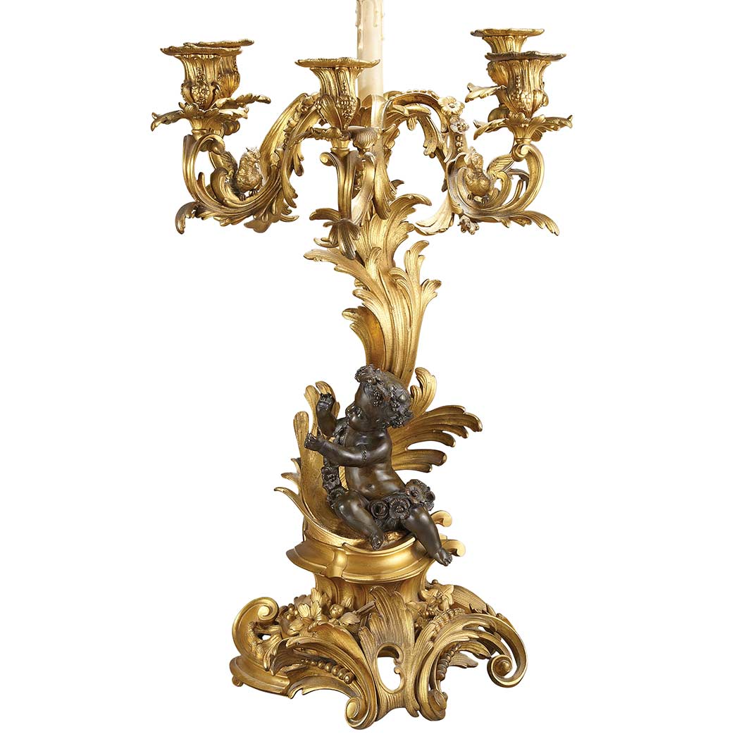 Appraisal: Louis XV Style Gilt and Patinated-Bronze Figural Five-Light Candelabrum Late