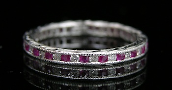 Appraisal: Platinum Diamond and Ruby Eternity Ring Platinum band setting features