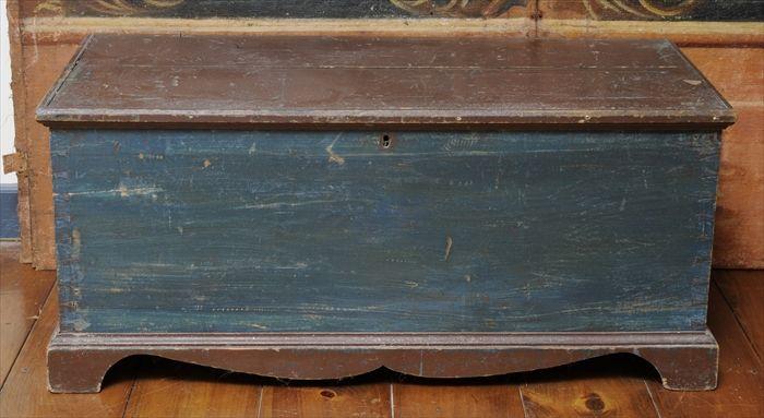 Appraisal: BLUE AND BROWN-PAINTED SMALL BLANKET CHEST The rectangular hinged lid