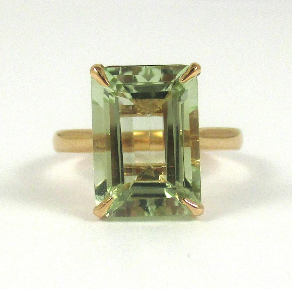 Appraisal: PRASIOLITE AND FOURTEEN KARAT ROSE GOLD RING The solitaire ring