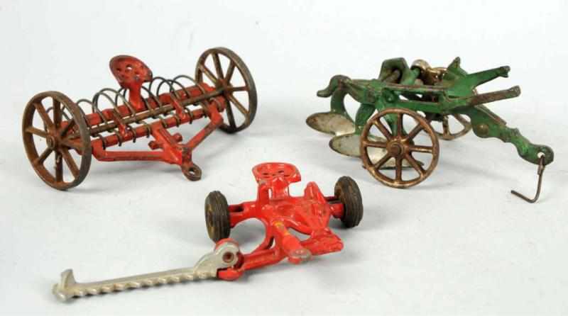 Appraisal: Lot of Cast Iron Metal Farm Implements Includes one hay