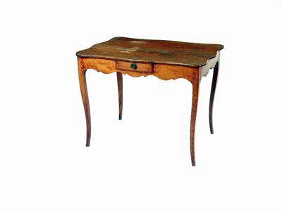 Appraisal: An early th century French cherry wood side table with