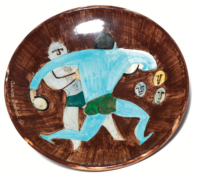 Appraisal: Aaron Bohrod plate made by Stonelain hand-painted scene of athletes