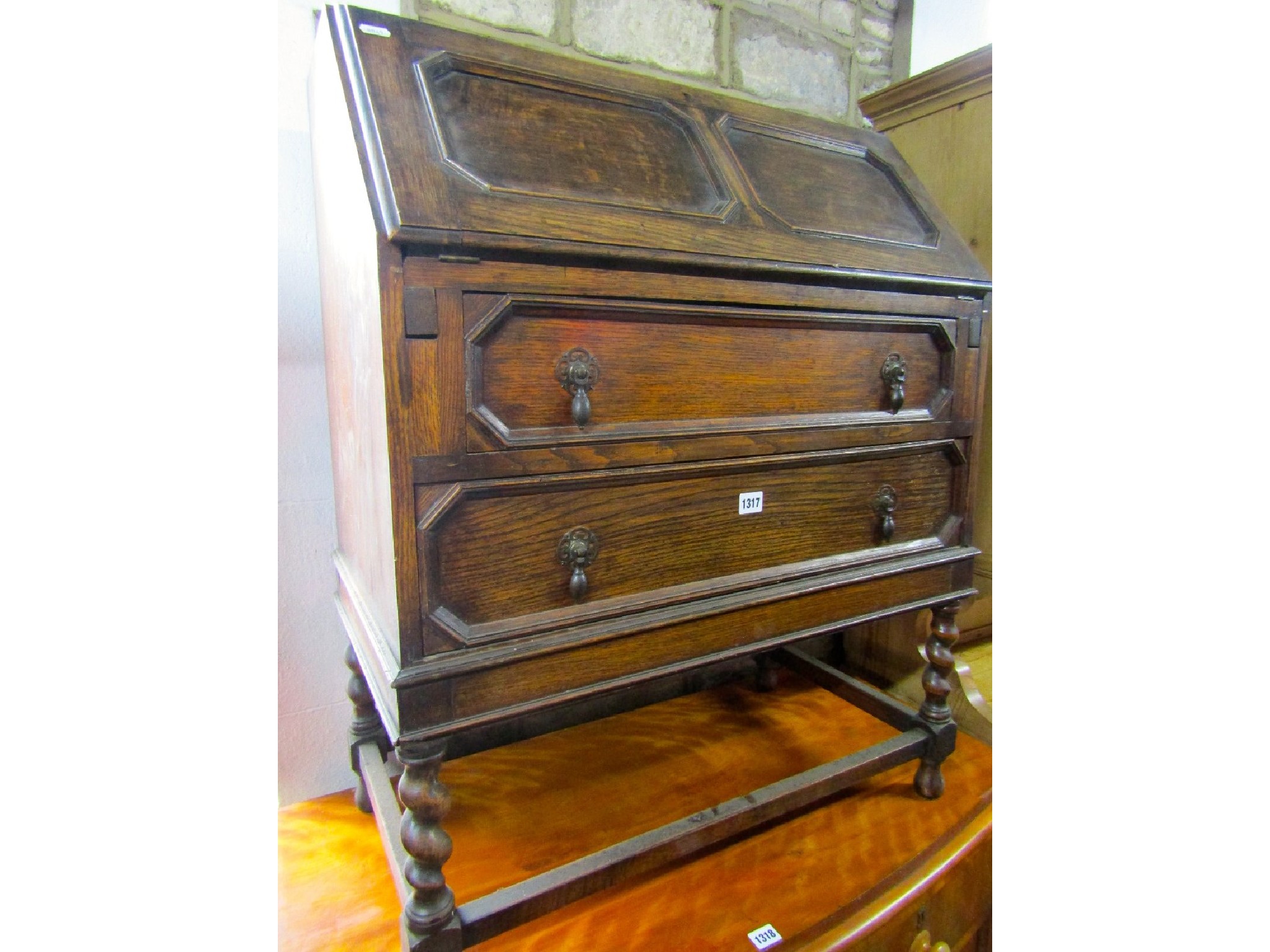 Appraisal: A s oak Jacobean revival bureau with geometric mouldings the