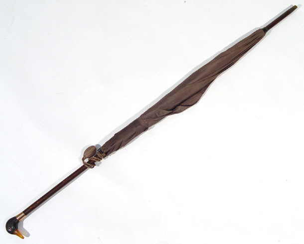 Appraisal: Mahogany parasol the handle carved with a ducks head and