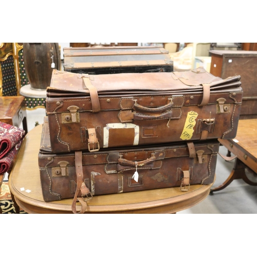 Appraisal: Two leather suitcases each approx cm H x cm W