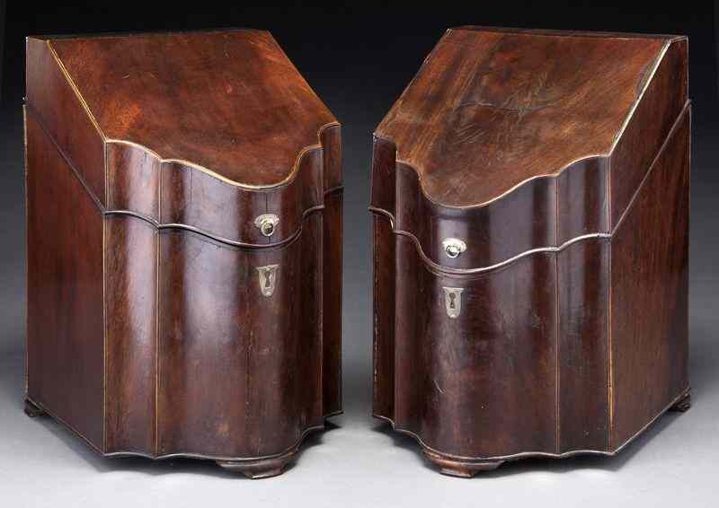 Appraisal: Pr Georgian mahogany knife boxeswith slanted serpentine shaped lids with