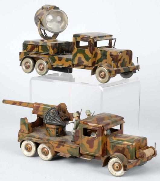 Appraisal: Lot of Tin Litho Tippco Military Trucks German Both clockwork