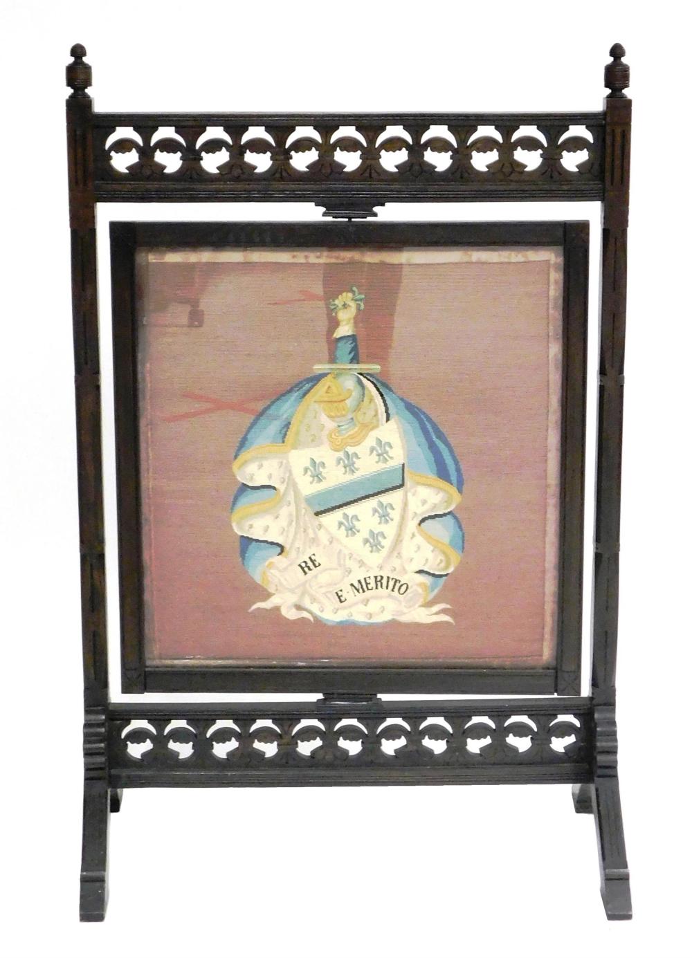 Appraisal: th C fire screen dark wood with swivel panel needlepoint