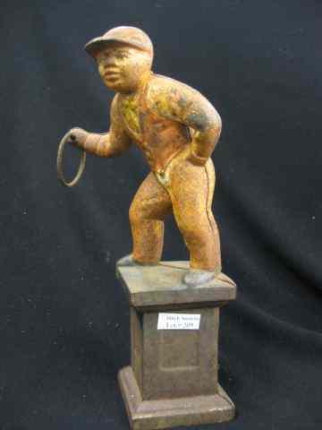 Appraisal: Cast Iron Figural Doorstop of a Jockey hitching post style