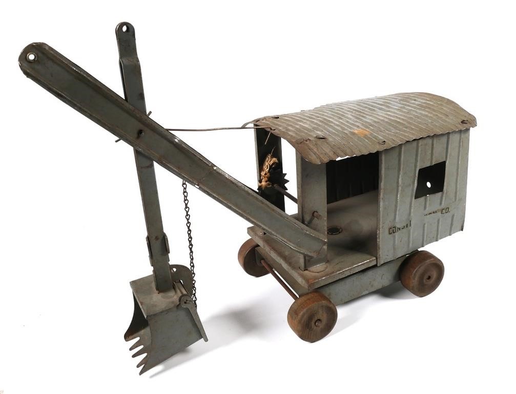 Appraisal: A vintage pressed steel toy steam shovel loader with wooden