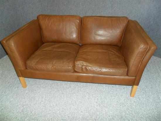 Appraisal: A STOUBY DANISH BROWN LEATHER TWO SEAT SOFA raised on