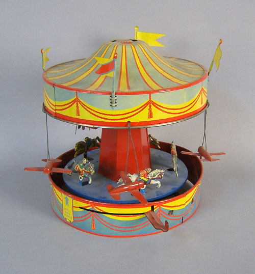 Appraisal: Wolverine tin lithograph merry-go-around No h