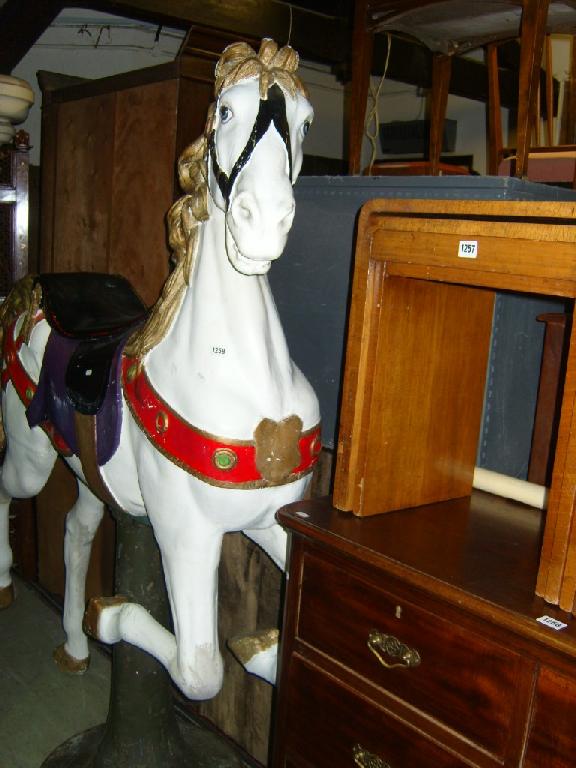 Appraisal: A large fibreglass fair ground horse with decoratively painted finish