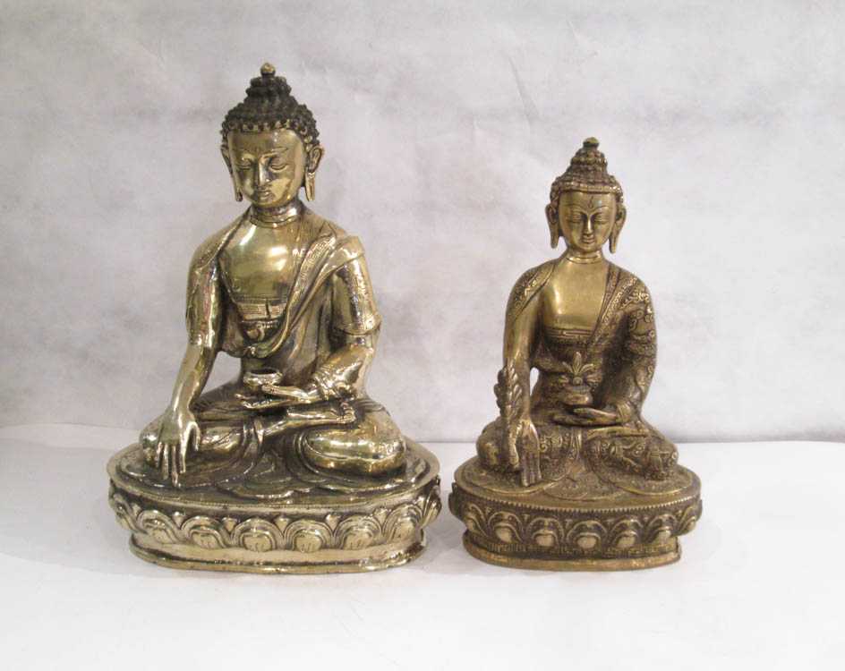 Appraisal: TWO BRONZE BUDDHA FIGURES Nepal Kathmandu Valley both in seated