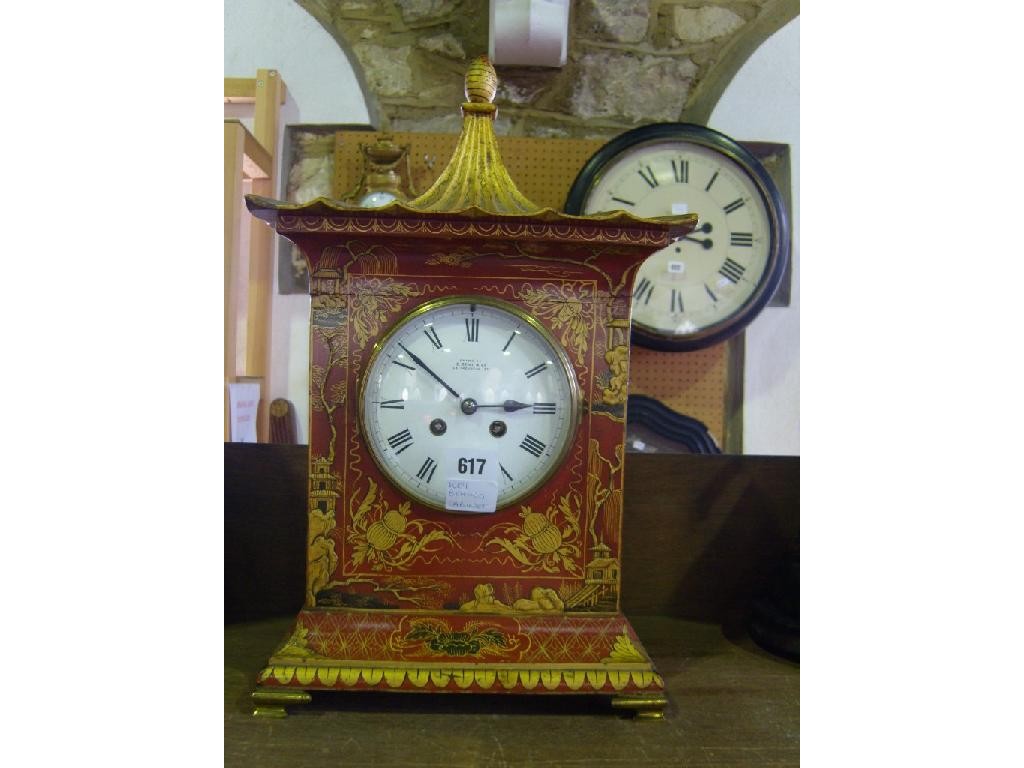 Appraisal: An Edwardian mantle clock in a Regency style the red