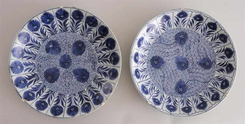 Appraisal: TWO SIMILAR DELFT BLUE AND WHITE CHARGERS With underglaze leaf