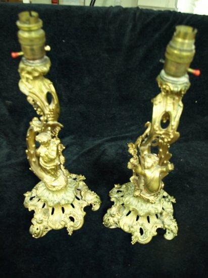 Appraisal: A pair of mid th Century bronze candlesticks of Rococo