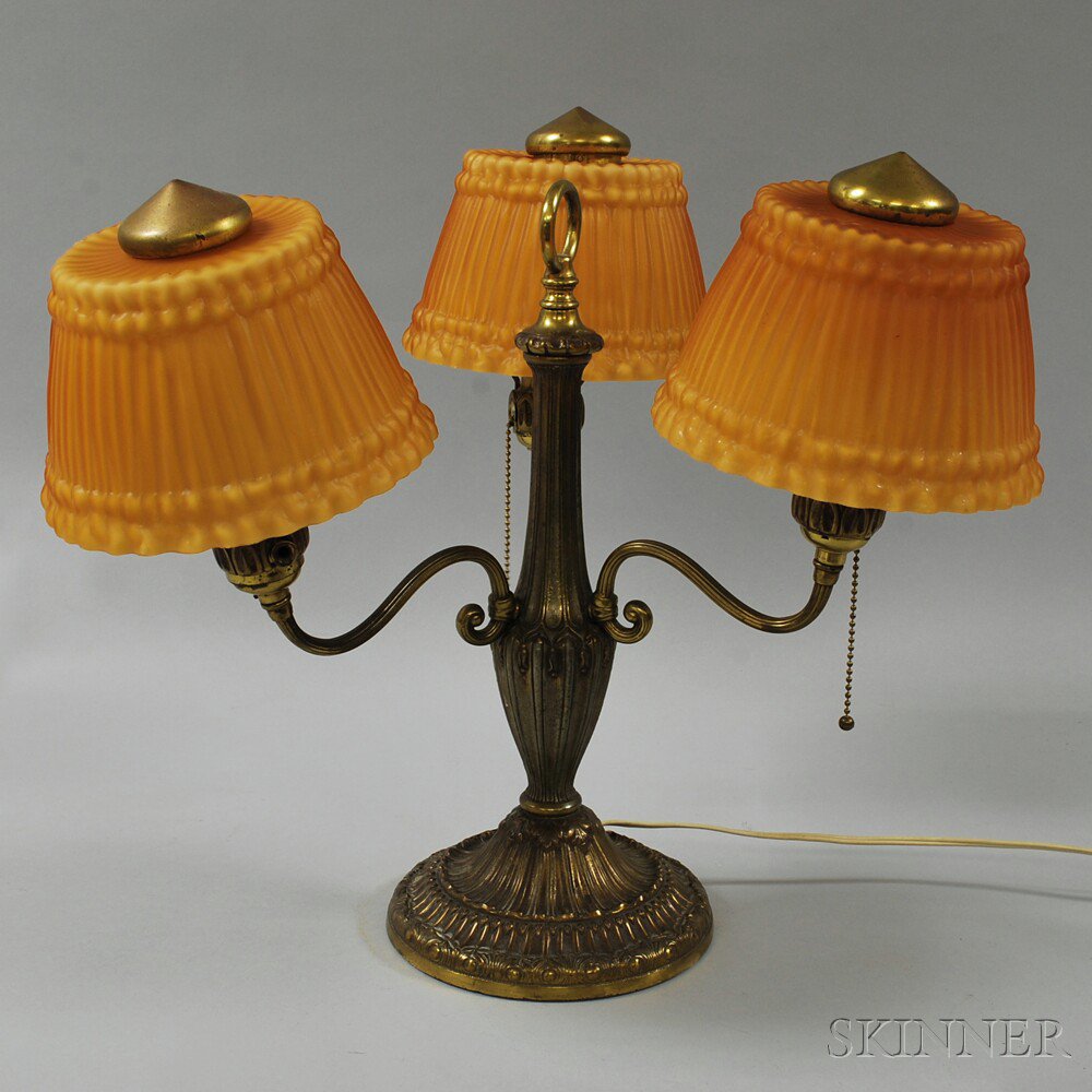 Appraisal: Brass Three-arm Table Lamp the vasiform shaft with three scrolled