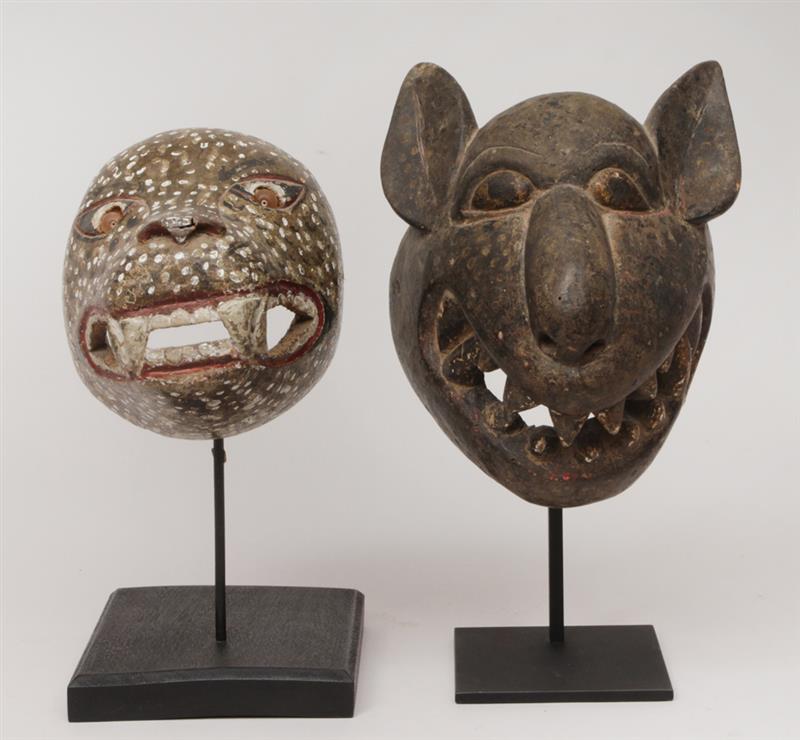 Appraisal: Two African Painted Wood Animal Masks One of a jaguar