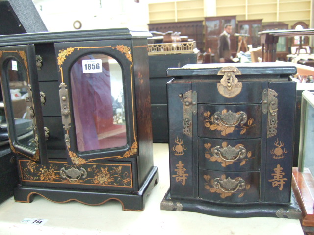 Appraisal: A reproduction ebonised and gilt decorated jewellery box with Chinese