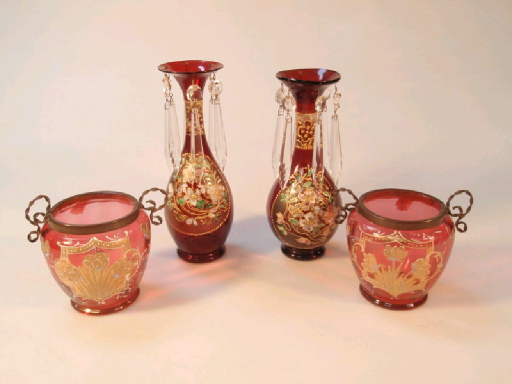 Appraisal: A pair of ruby glass baluster vases with everted rims