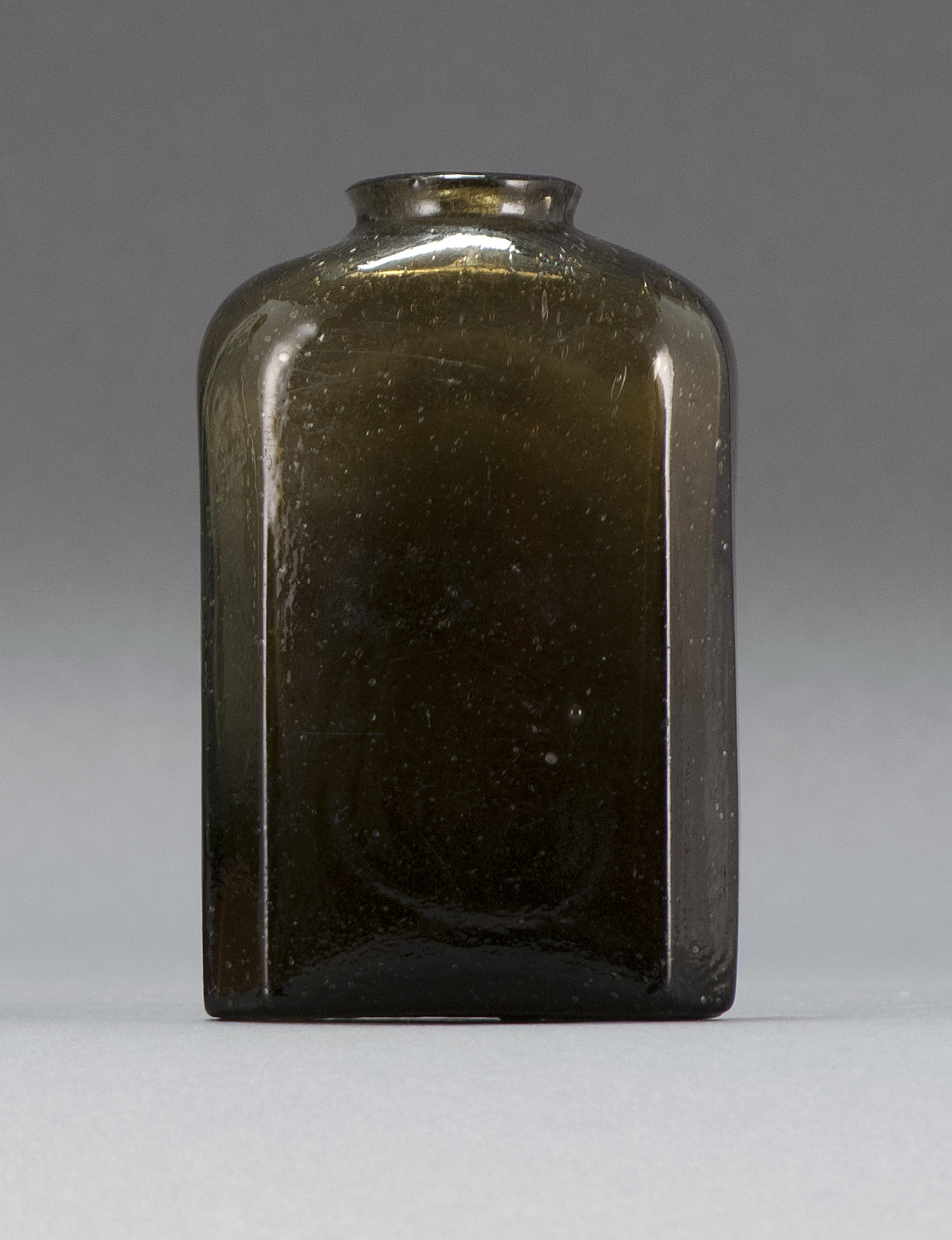 Appraisal: BLOWN-MOLDED GLASS STORAGE JAR Early th CenturyPossibly Keene In rectangular