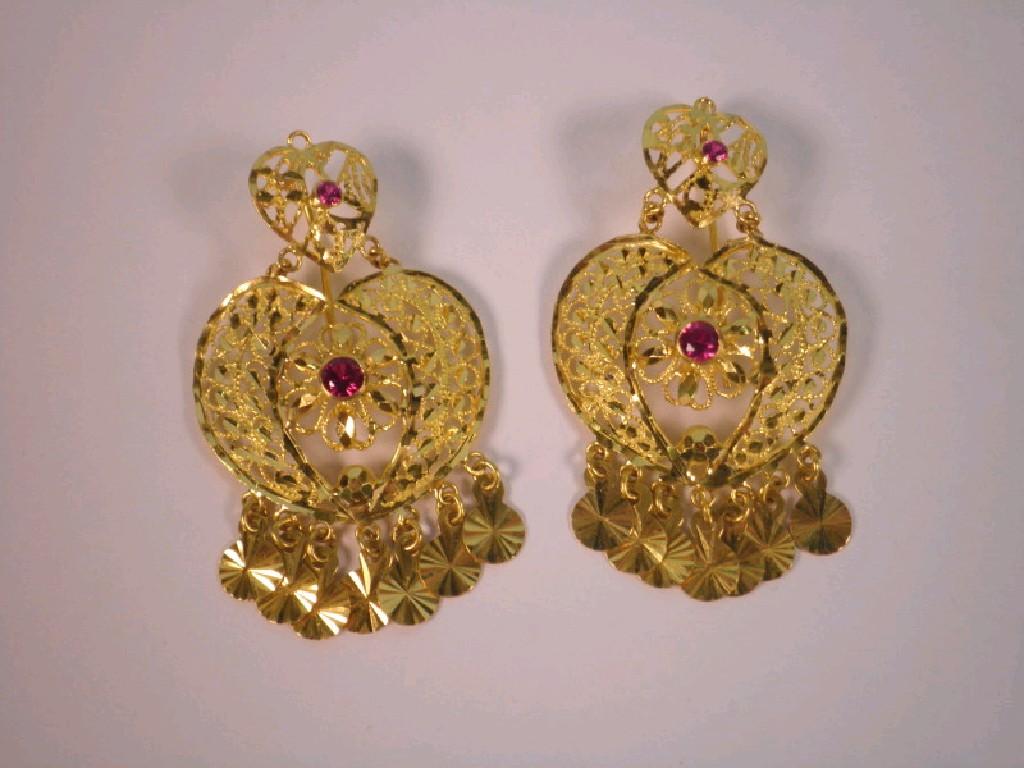 Appraisal: A pair of double heart shaped Asian design earrings set