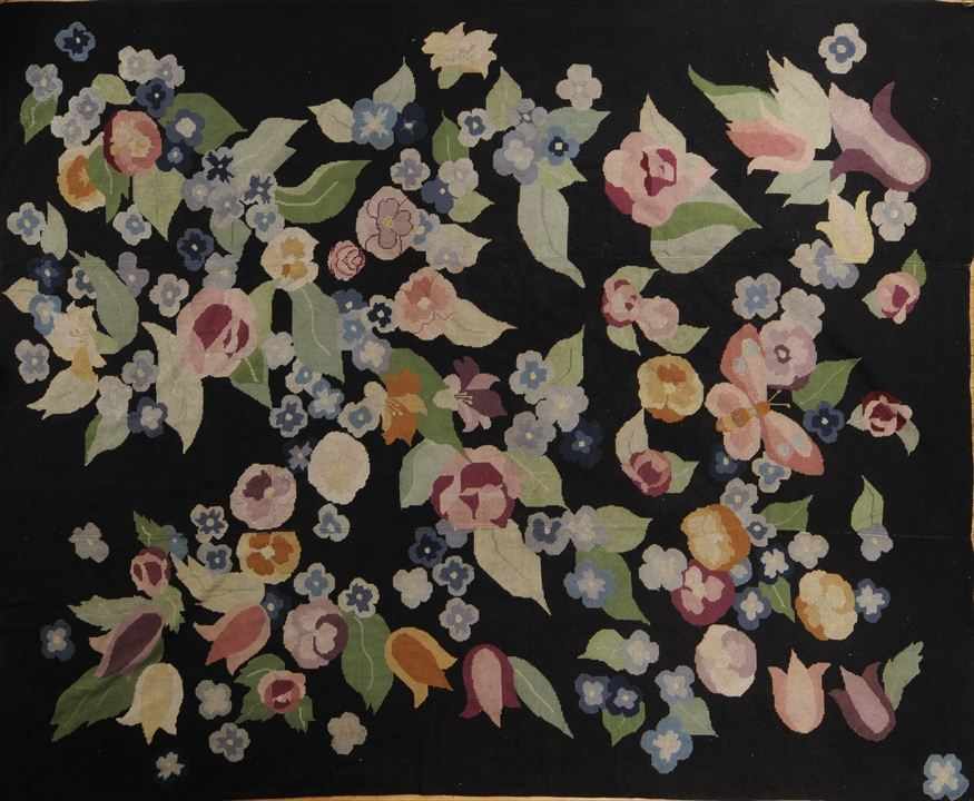 Appraisal: BLACK-GROUND NEEDLEPOINT CARPET Worked with colorful flowerheads and green pinnate