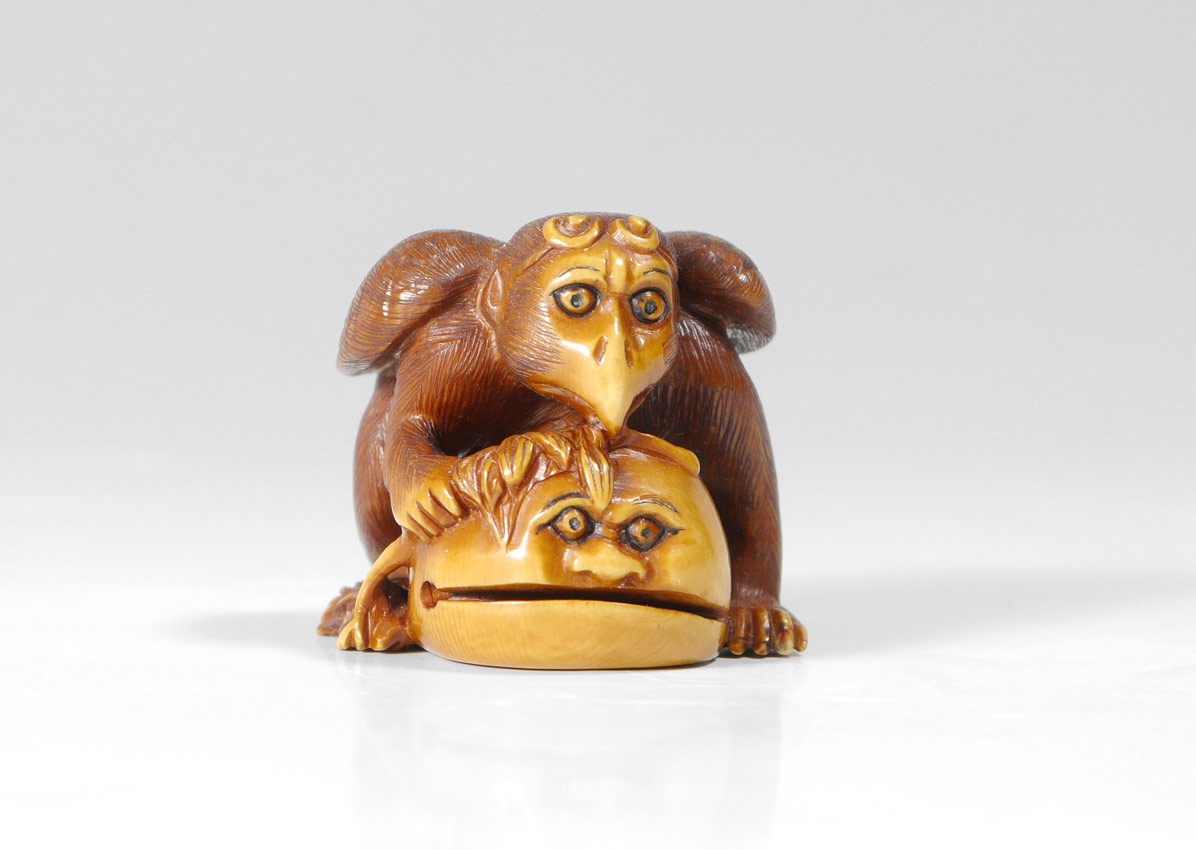 Appraisal: CARVED IVORY MYTHOLOGICAL WINGED CREATURE NETSUKE Creature in the form