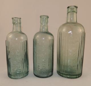 Appraisal: Poison aqua round bottles Poison- aqua round embossed 'Poisonous Not