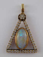 Appraisal: A yellow metal tests carat gold opal and diamond triangular