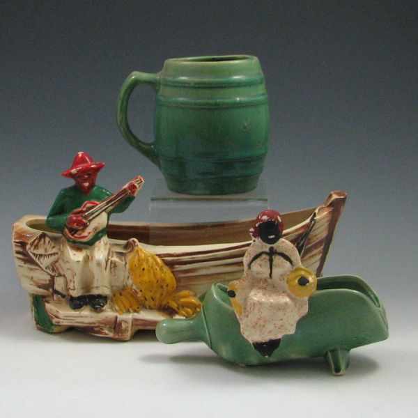 Appraisal: McCoy Banana Boat Mammy Planters with Nelson McCoy Mug boat