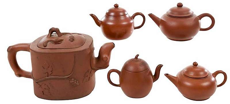 Appraisal: Group of Five Yixing Teapots Asian four miniature one with