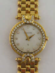 Appraisal: BUCHERER a lady's carat gold and diamond quartz wristwatch the