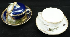 Appraisal: A German porcelain cup and cover with saucer all centrally