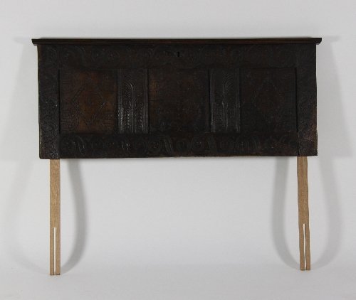 Appraisal: A th Century oak coffer front now a headboard cm