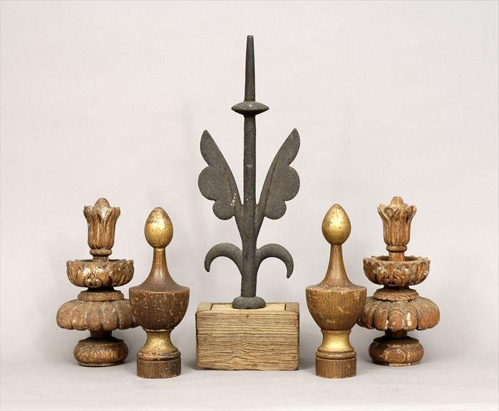 Appraisal: Two Pairs of Carved Wood Finials Together with a cast-iron