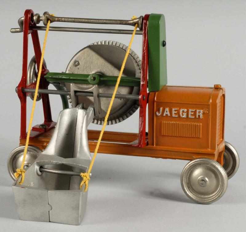 Appraisal: Cast Iron Arcade Jaeger Concrete Mixer Toy Description American Large