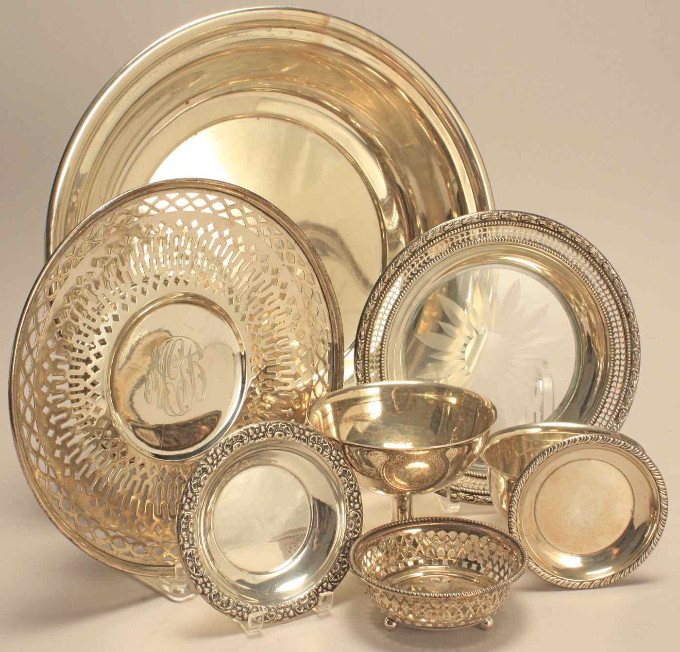 Appraisal: EIGHT STERLING SILVER HOLLOWWARE PIECESBy various makers Includes a large