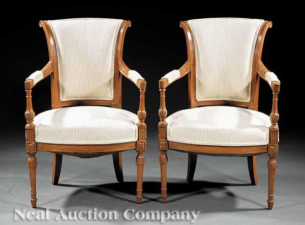 Appraisal: A Pair of Directoire Fruitwood Fauteuils late th c padded