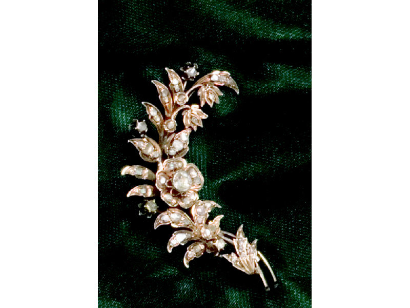 Appraisal: ANTIQUE DIAMOND BROOCH Yellow gold floral curved design set with