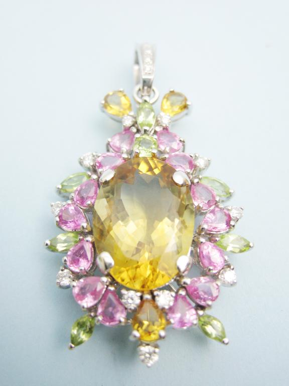 Appraisal: A Gemstone Pendant the large oval shaped Citrine in a