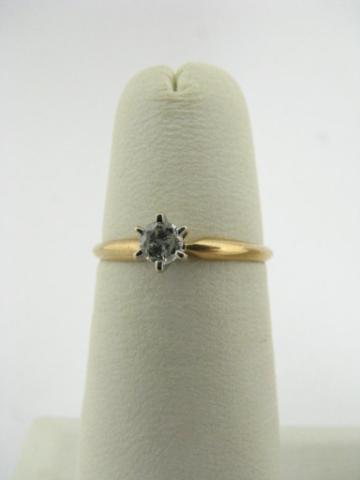 Appraisal: K yellow gold ring with six prong mounted round center