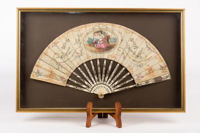 Appraisal: A Regency fan with painted oval vignette of a couple