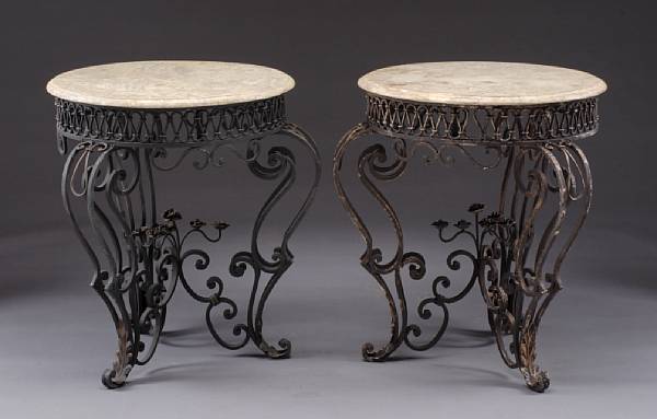 Appraisal: A pair of Baroque style wrought iron and marble tables