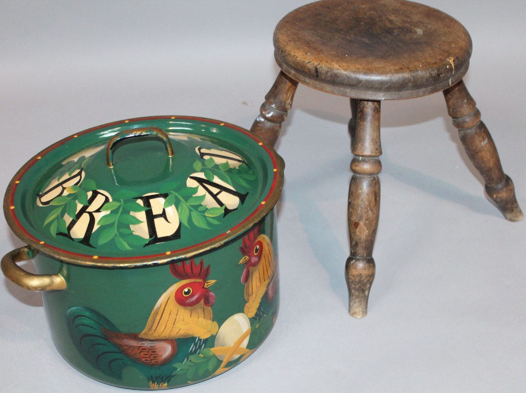 Appraisal: A late thC elm stool the circular top raised on