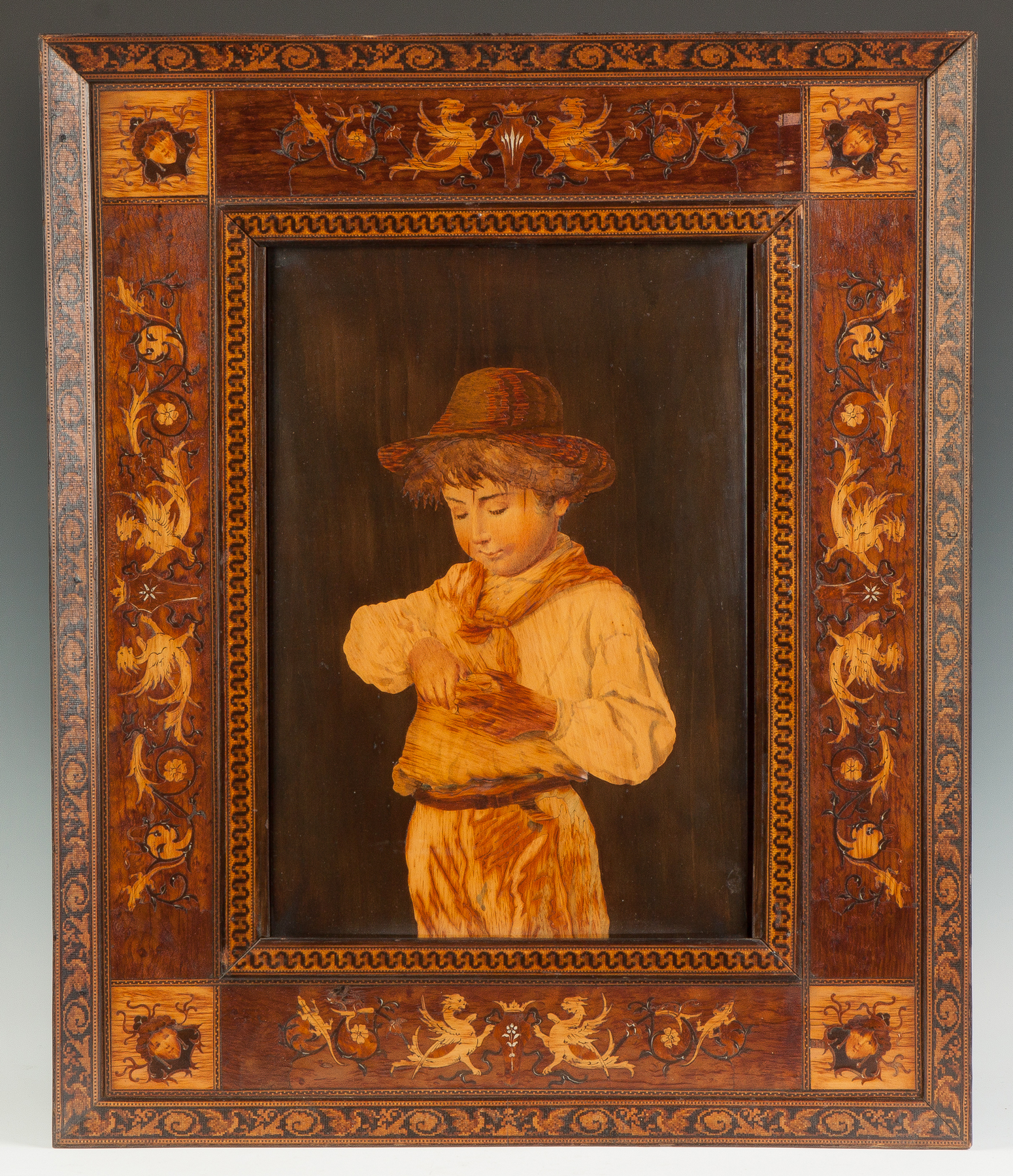 Appraisal: Marquetry of a Young Boy with an Apple th cent