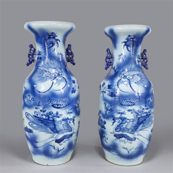 Appraisal: Pair of tall antique Chinese blue and white porcelain vases